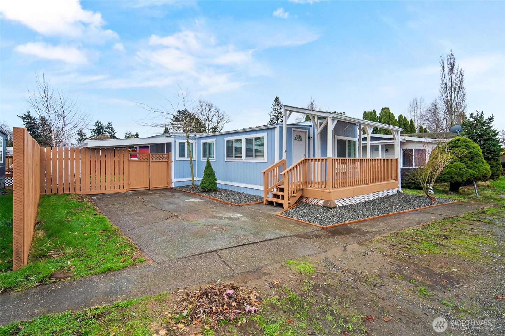2392 Douglas Road, Unit 4 Ferndale, WA 98248 - Photo 2 of 39 a view of a house with a yard and plants