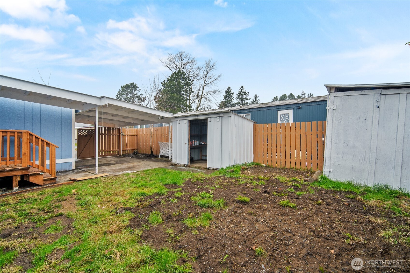 2392 Douglas Road, Unit 4 Ferndale, WA 98248 - Photo 30 of 39 a view of a house with backyard and porch
