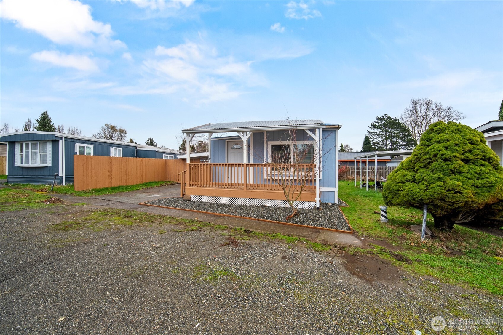2392 Douglas Road, Unit 4 Ferndale, WA 98248 - Photo 33 of 39 a view of a house with backyard and a tree