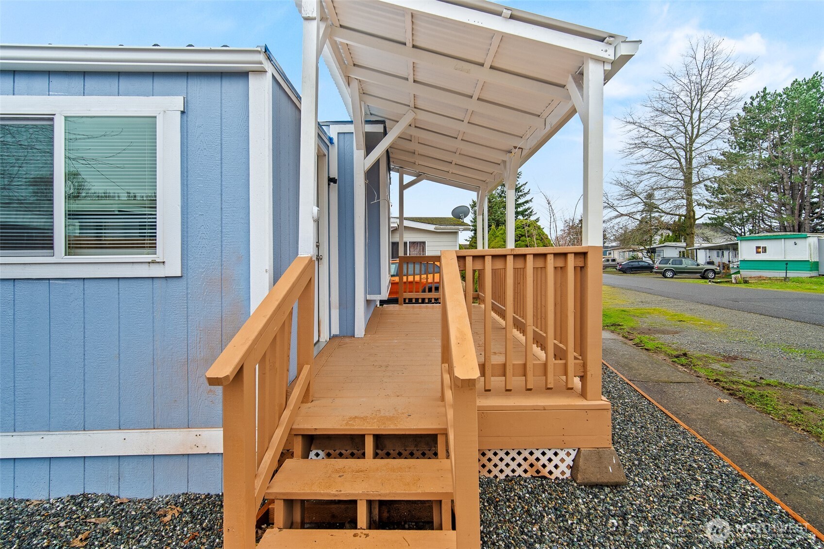 2392 Douglas Road, Unit 4 Ferndale, WA 98248 - Photo 35 of 39 a view of a patio with a table and chairs