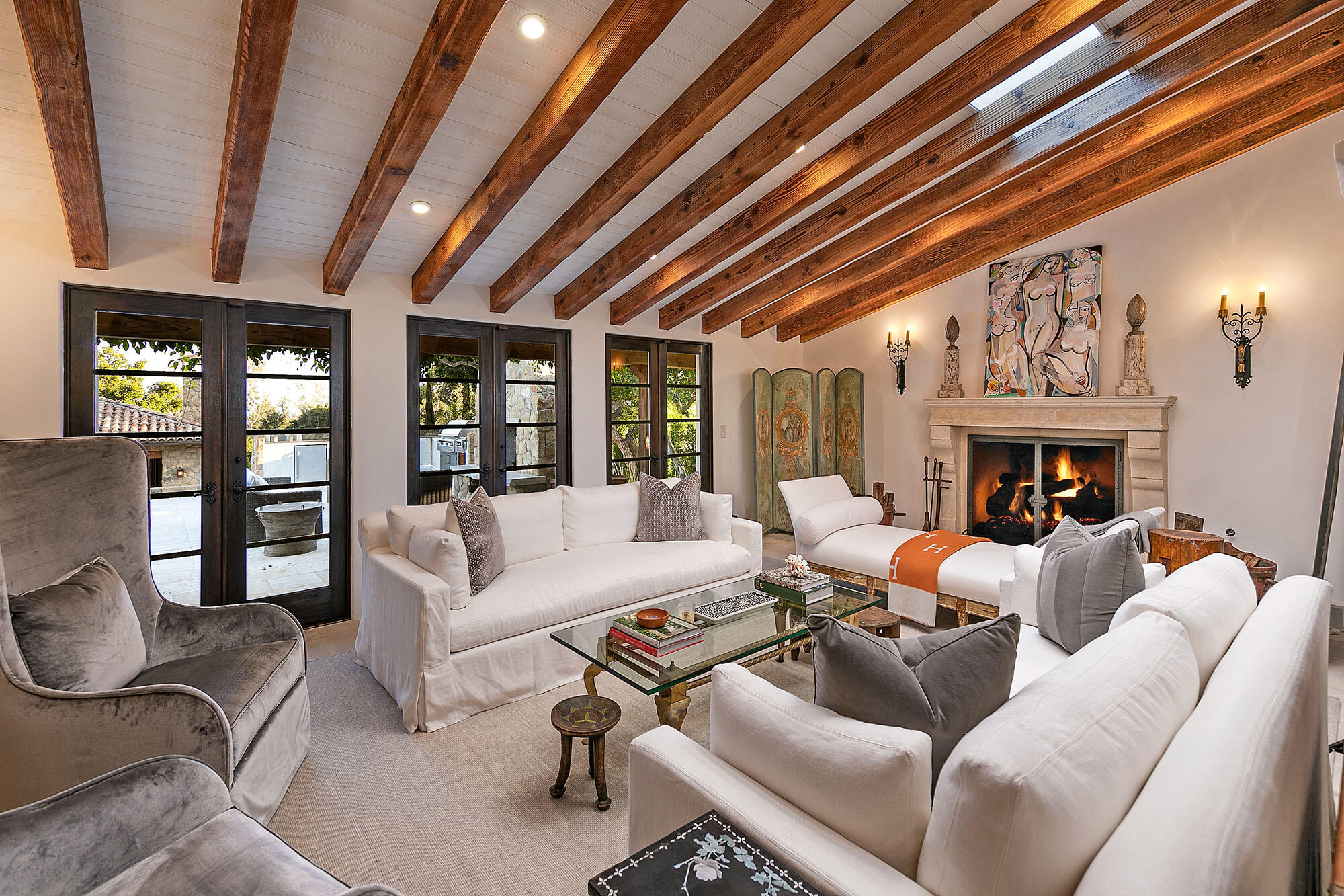 747 Via Manana Montecito, CA 93108 - Photo 14 of 49 a living room with furniture a fireplace and a chandelier