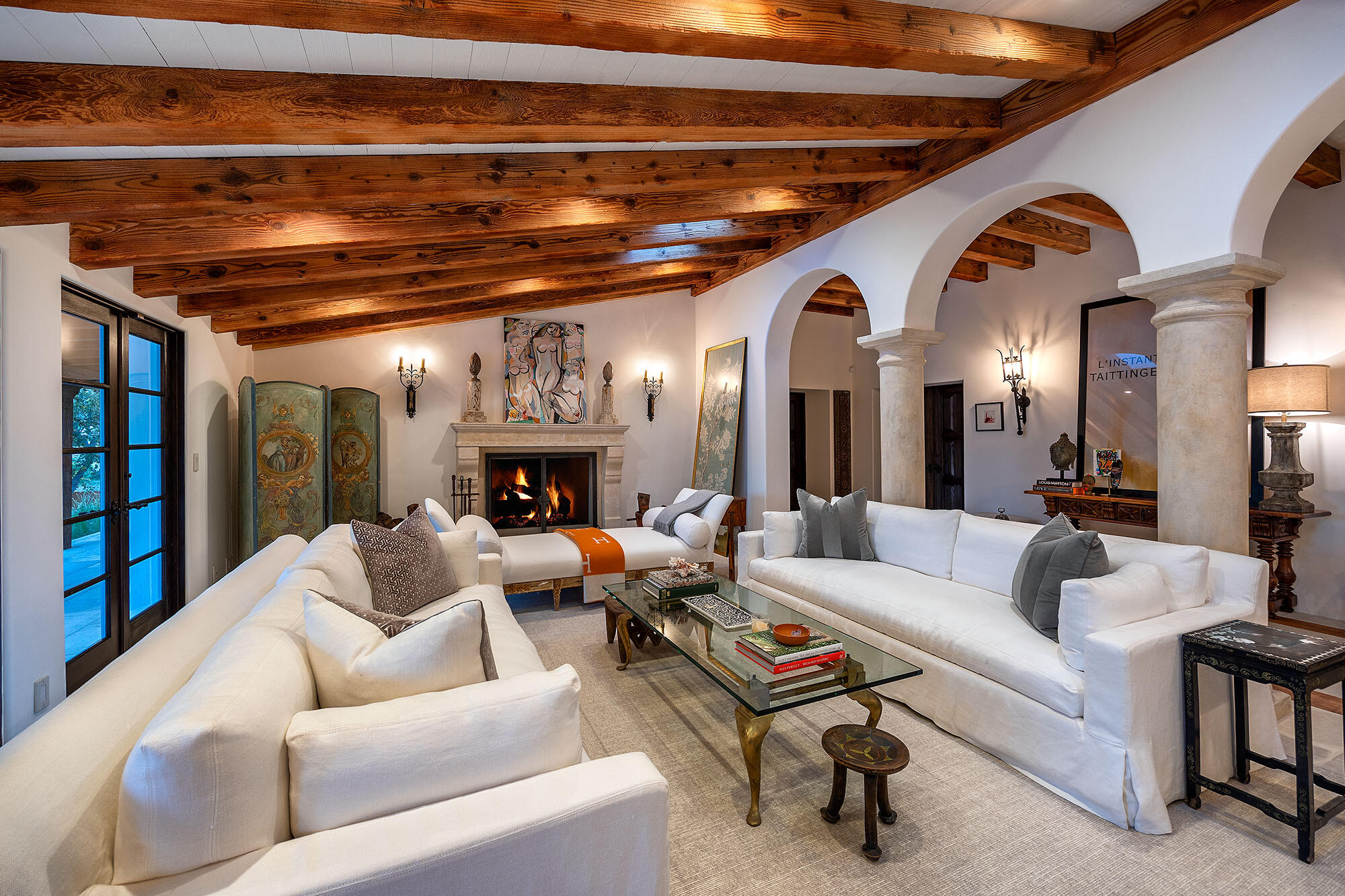 747 Via Manana Montecito, CA 93108 - Photo 15 of 49 a living room with furniture a fireplace and a chandelier