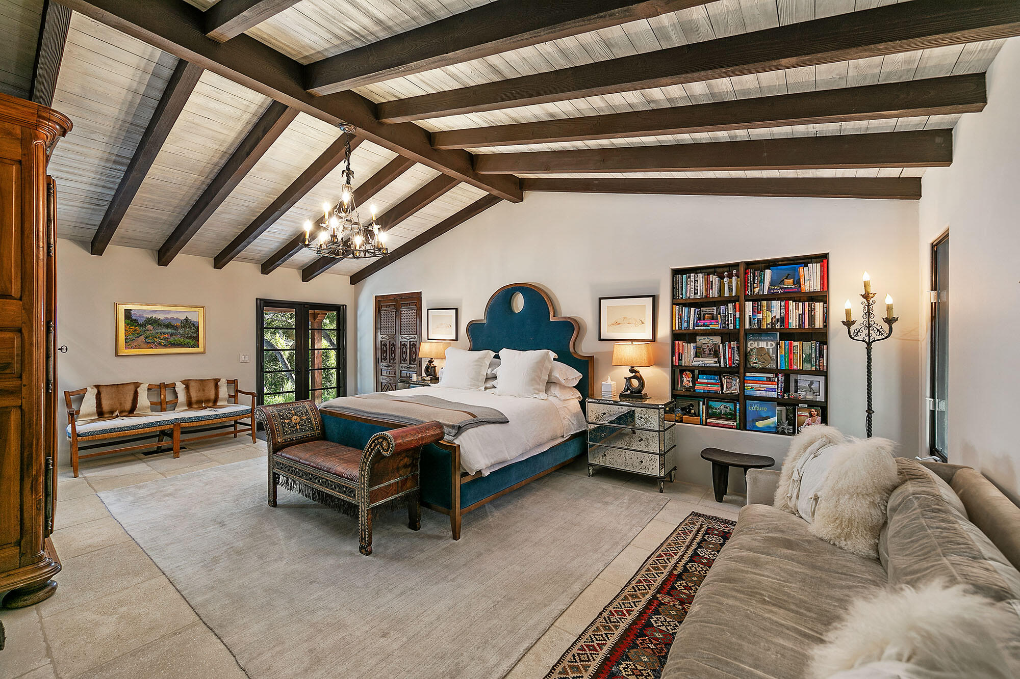 747 Via Manana Montecito, CA 93108 - Photo 17 of 49 a bedroom with furniture and a book shelf