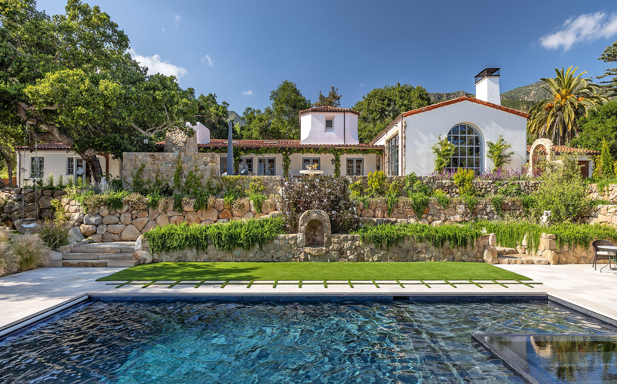 747 Via Manana Montecito, CA 93108 - Photo 27 of 49 a front view of a house with a garden