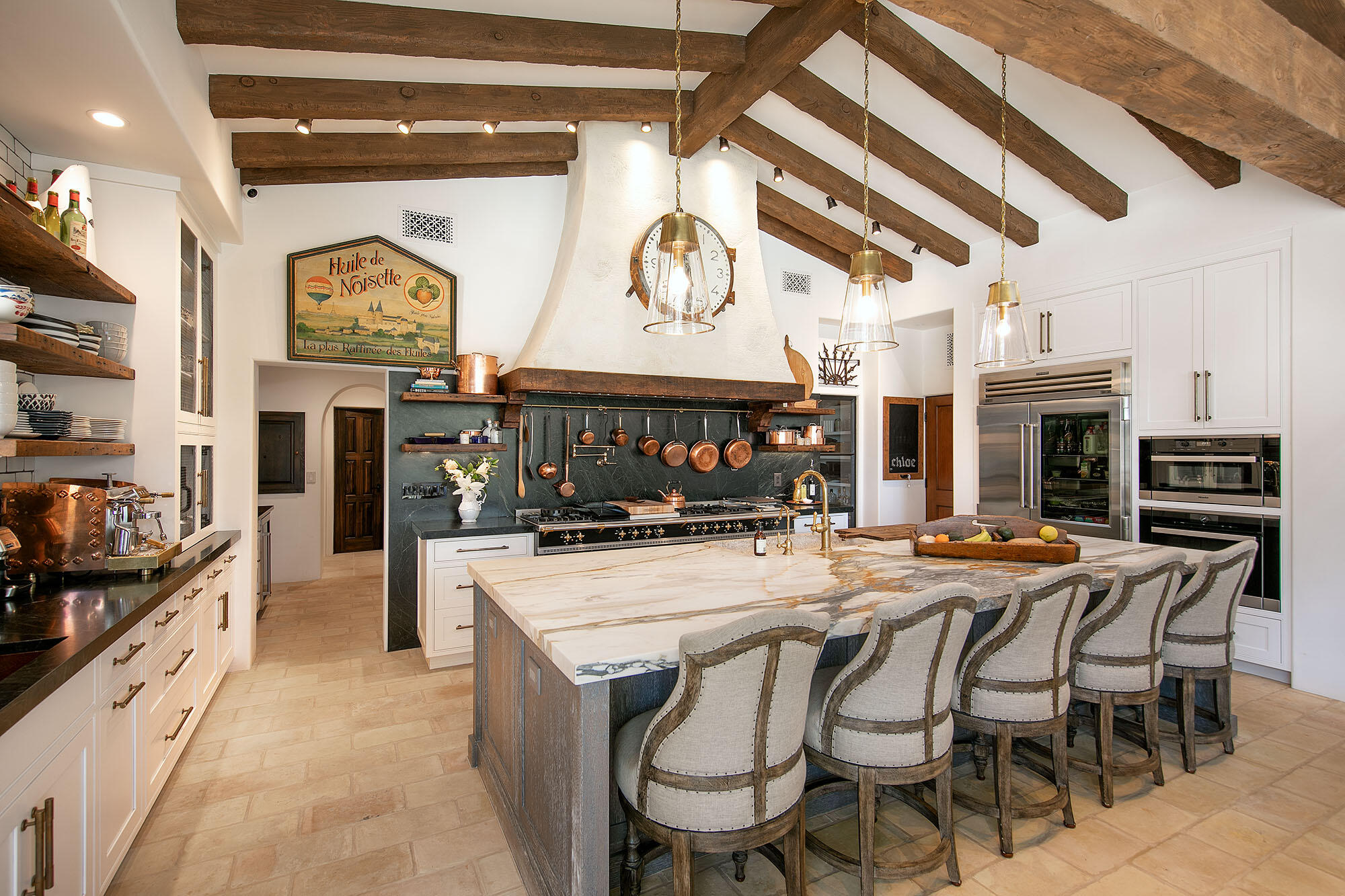 747 Via Manana Montecito, CA 93108 - Photo 10 of 49 a view of a dining area with furniture and a kitchen