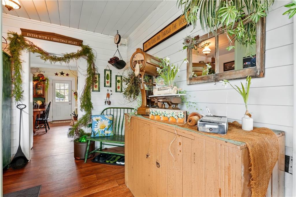 397 Evans City Road Butler, PA 16001 - Photo 12 of 50 a dining room filled with furniture and wooden floor