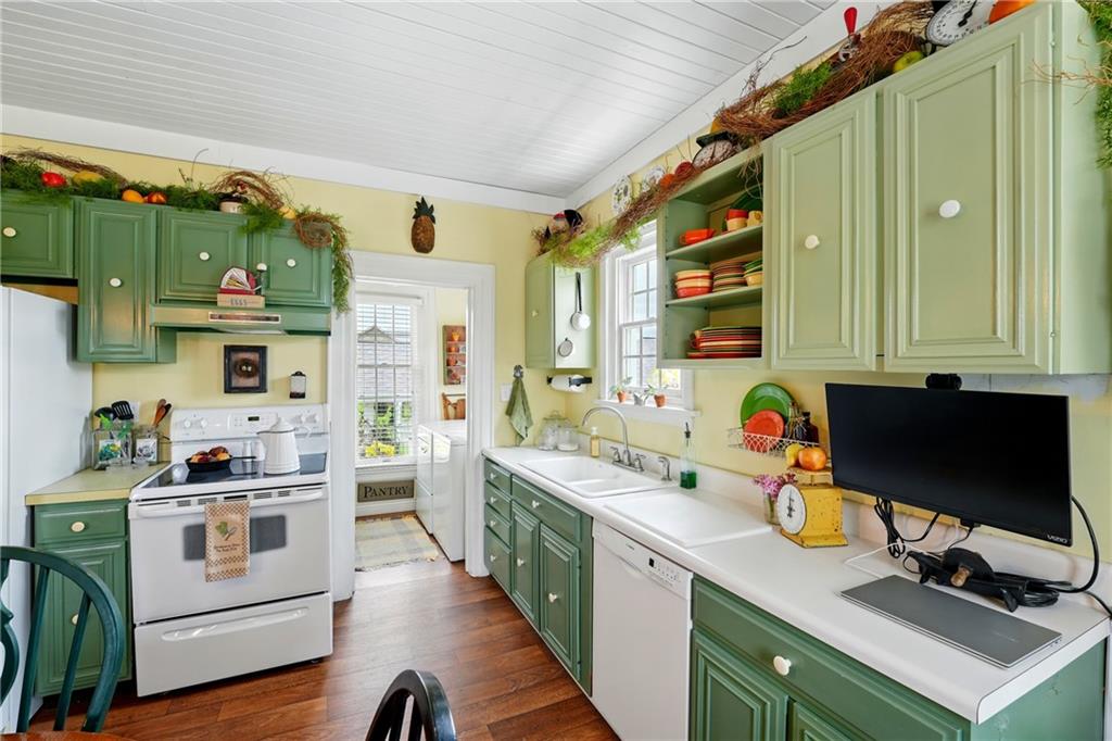 397 Evans City Road Butler, PA 16001 - Photo 16 of 50 a kitchen with a stove a sink and a refrigerator