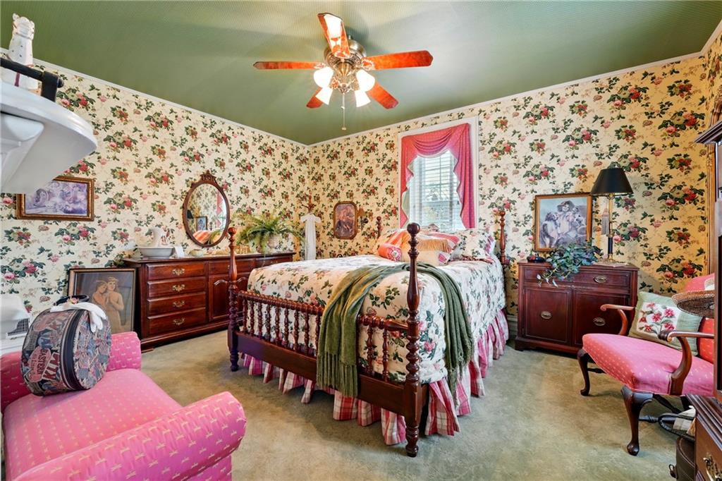 397 Evans City Road Butler, PA 16001 - Photo 25 of 50 a bedroom with furniture and a chandelier