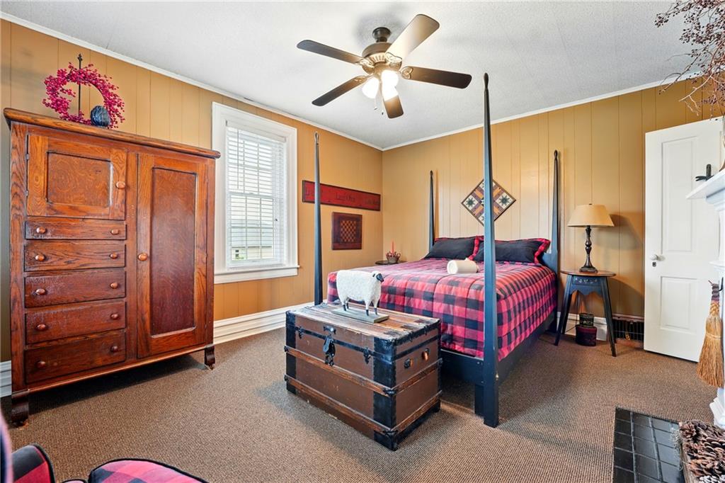 397 Evans City Road Butler, PA 16001 - Photo 26 of 50 a bedroom with a bed dresser and a window