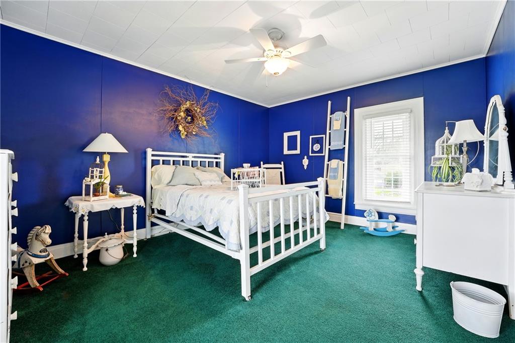397 Evans City Road Butler, PA 16001 - Photo 28 of 50 a bedroom with a bed and a window