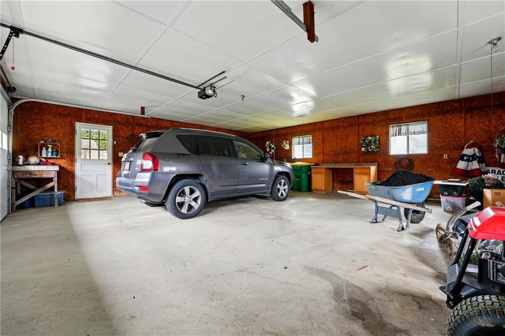 397 Evans City Road Butler, PA 16001 - Photo 34 of 50 a car parked in a garage