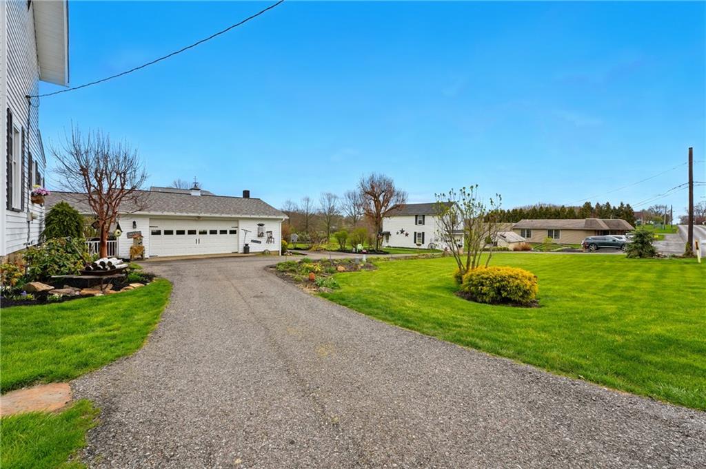 397 Evans City Road Butler, PA 16001 - Photo 36 of 50 a view of a street with a house in the background