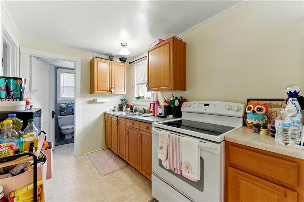 397 Evans City Road Butler, PA 16001 - Photo 39 of 50 a kitchen that has a sink and a stove in it