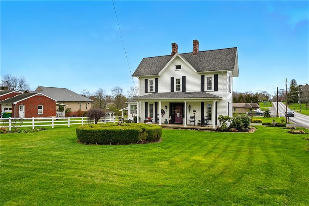 397 Evans City Road Butler, PA 16001 - Photo 48 of 50 a front view of a house with garden
