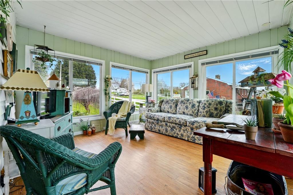 397 Evans City Road Butler, PA 16001 - Photo 9 of 50 a living room with furniture and a large window