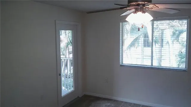 a view of empty room with windows