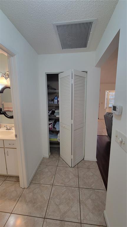 9331 Southwest 84th Terrace, Unit D Ocala, FL 34481 - Photo 26 of 32 a view of kitchen and utility room