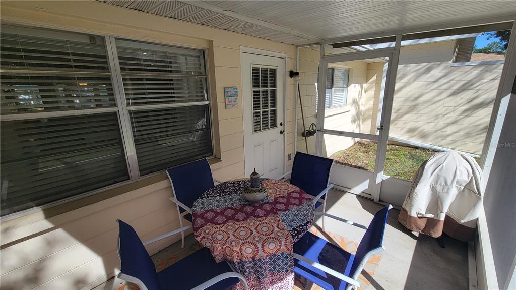 9331 Southwest 84th Terrace, Unit D Ocala, FL 34481 - Photo 27 of 32 a living room with furniture and a window