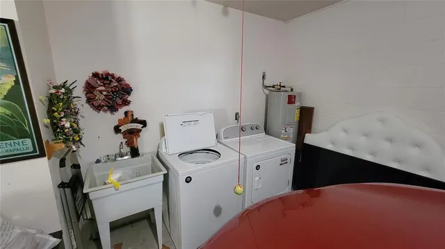 a bathroom with a sink toilet and vanity