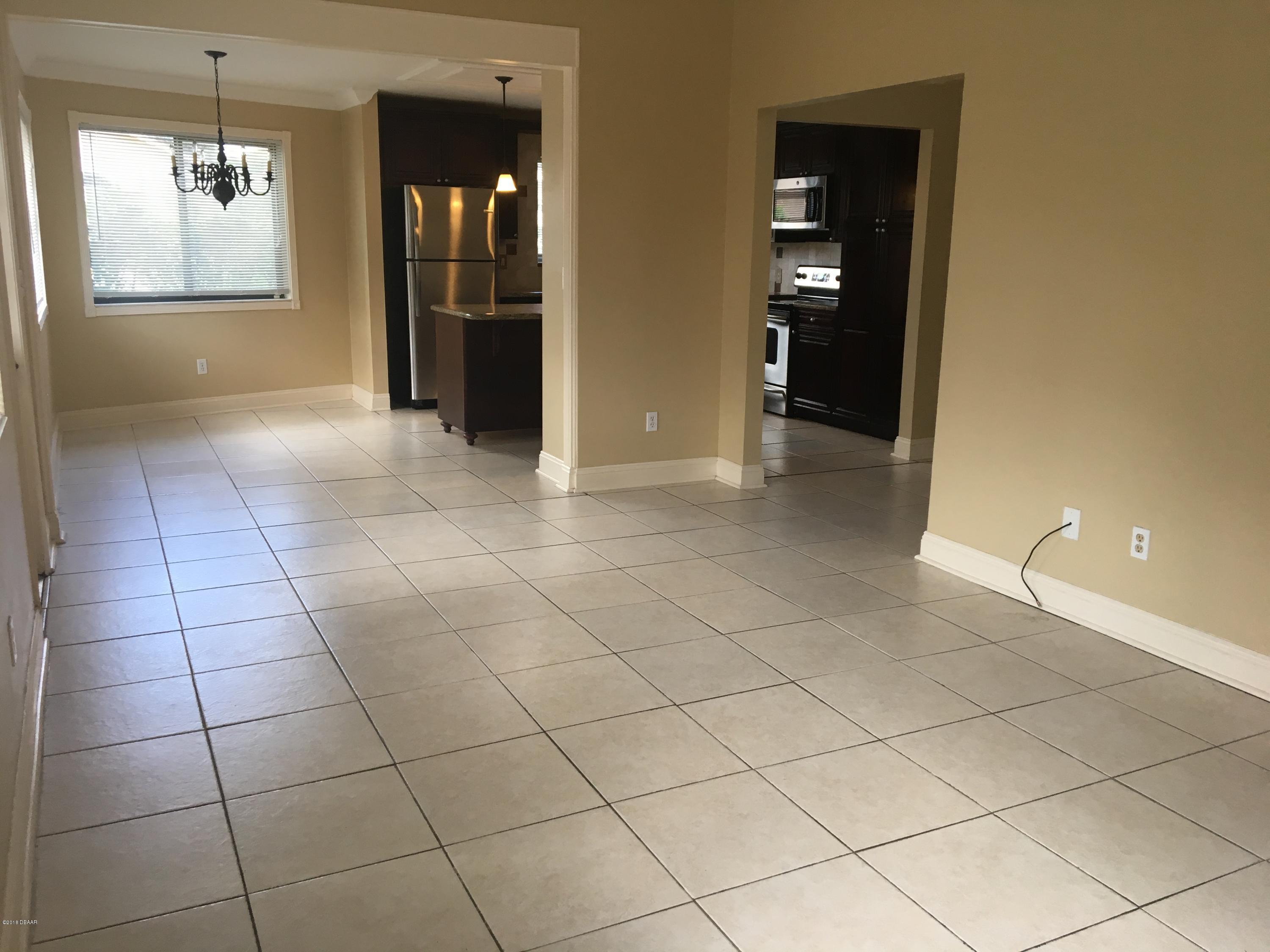132 Tern Court Daytona Beach, FL 32119 - Photo 13 of 34 a view of an empty room with a window