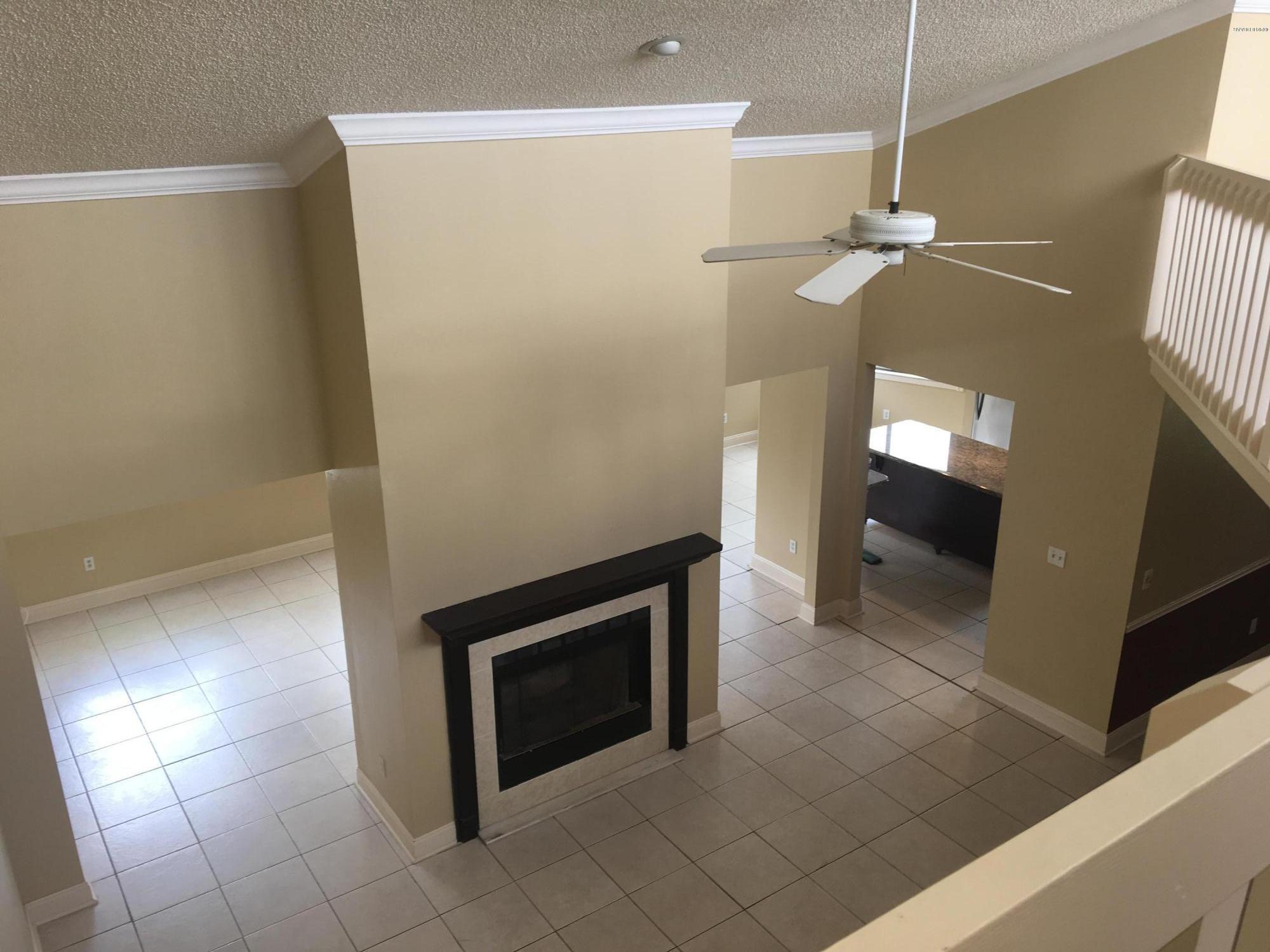 132 Tern Court Daytona Beach, FL 32119 - Photo 18 of 34 a view of a livingroom with a fireplace