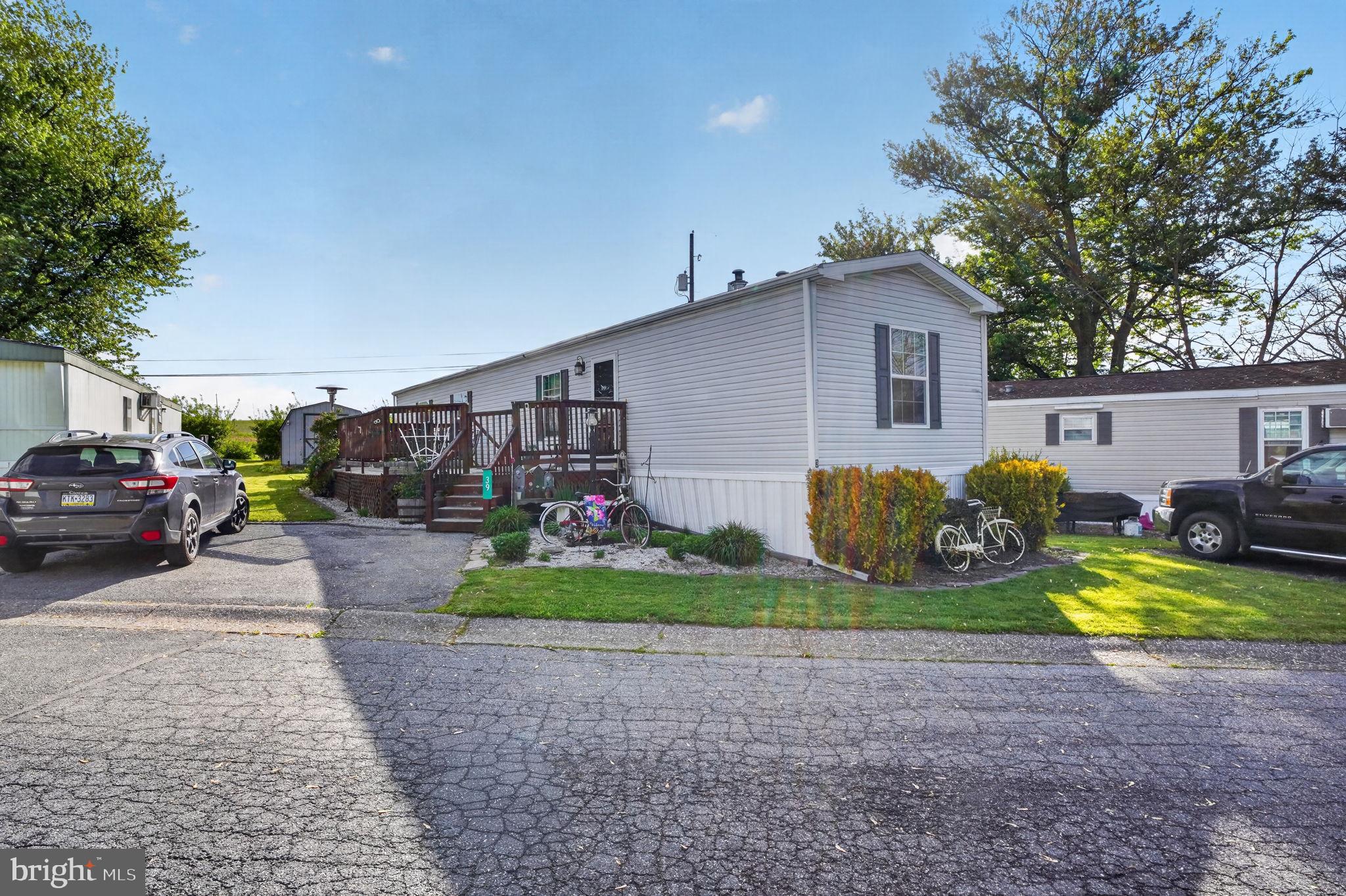 39 Country Club Road West Northampton, PA 18067 - Photo 26 of 26 a view of a back yard of the house and car parked
