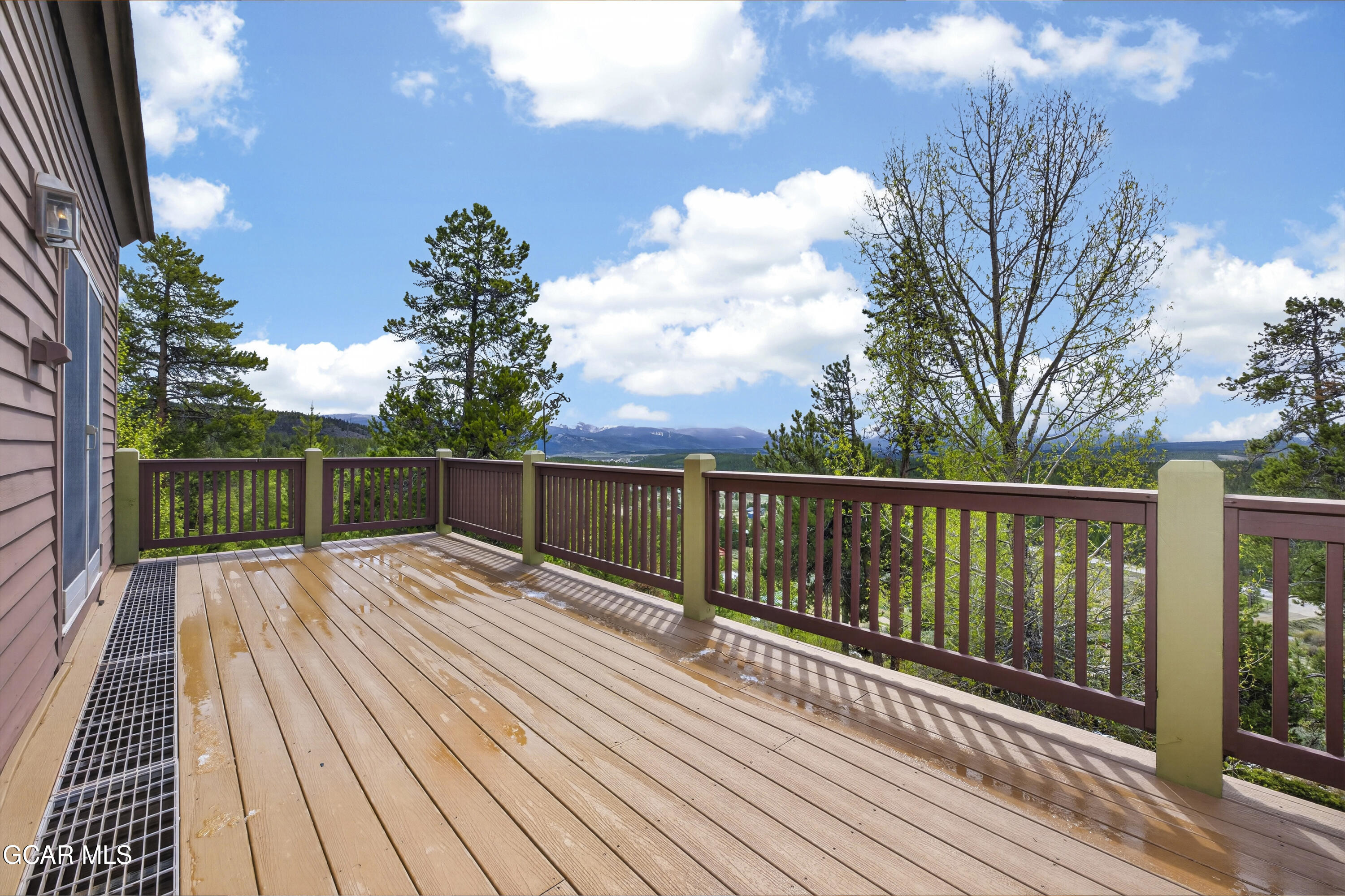 400 Ridge Road Tabernash, CO 80478 - Photo 23 of 50 a view of balcony with wooden floor and fence