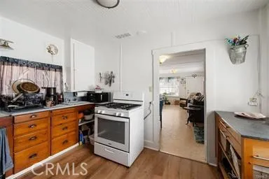 260 Pacific Street Morro Bay, CA 93442 - Photo 13 of 21 a kitchen with a stove and a sink