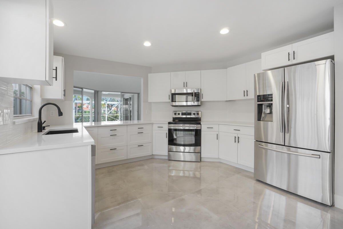 149 Eagleton Court Palm Beach Gardens, FL 33418 - Photo 16 of 49 Modern Kitchen