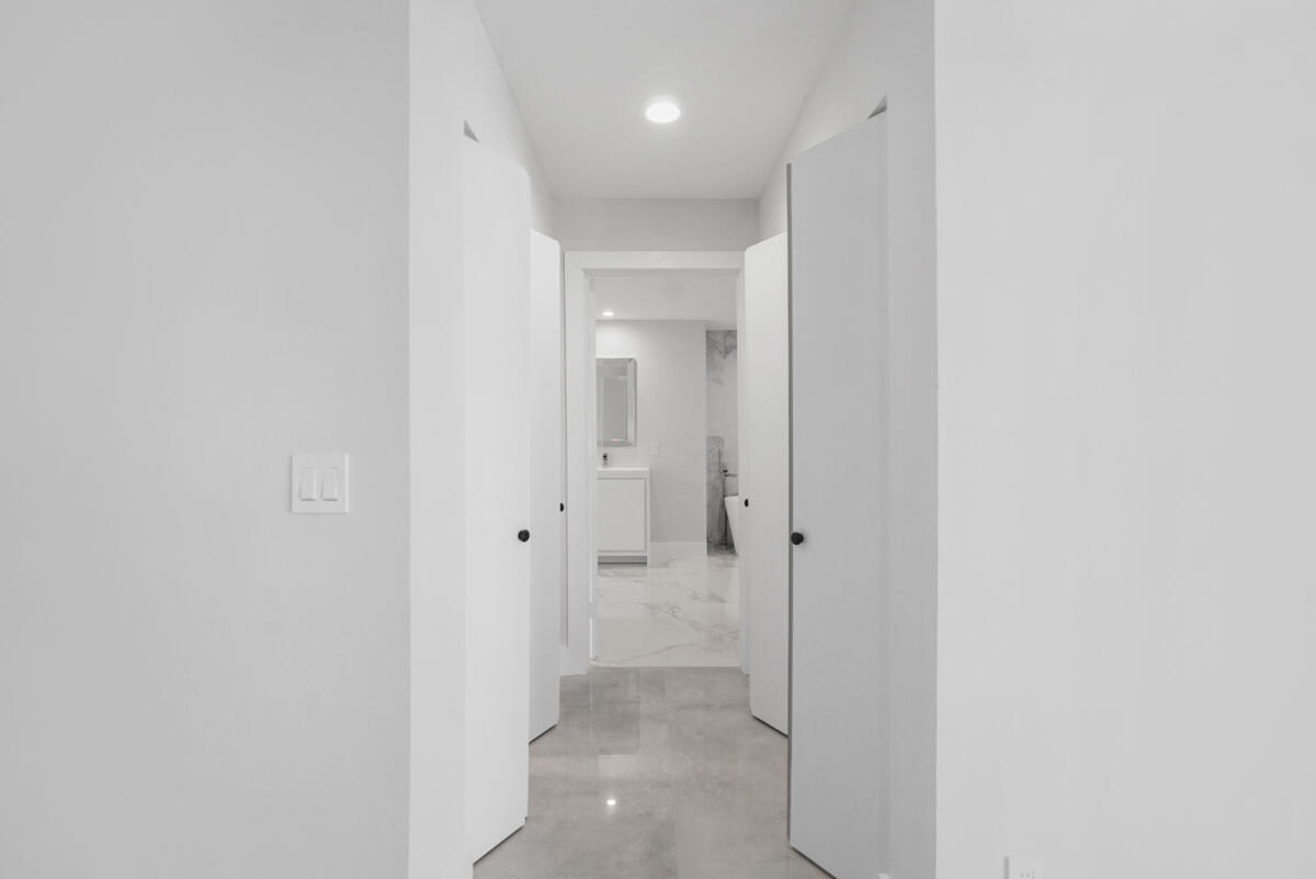 149 Eagleton Court Palm Beach Gardens, FL 33418 - Photo 23 of 49 His/Hers Closets