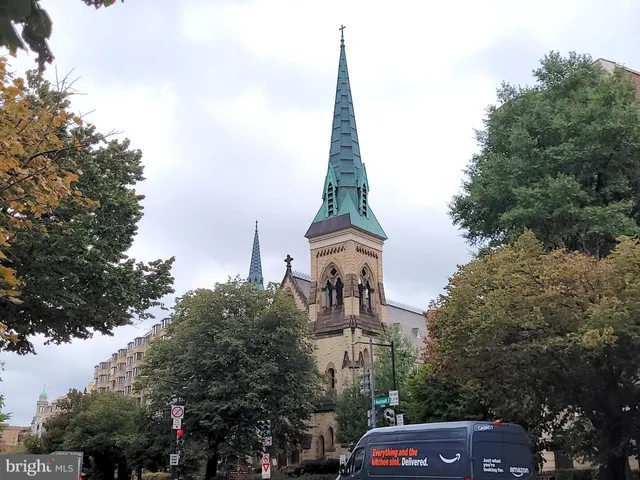 a view of a city with tall buildings