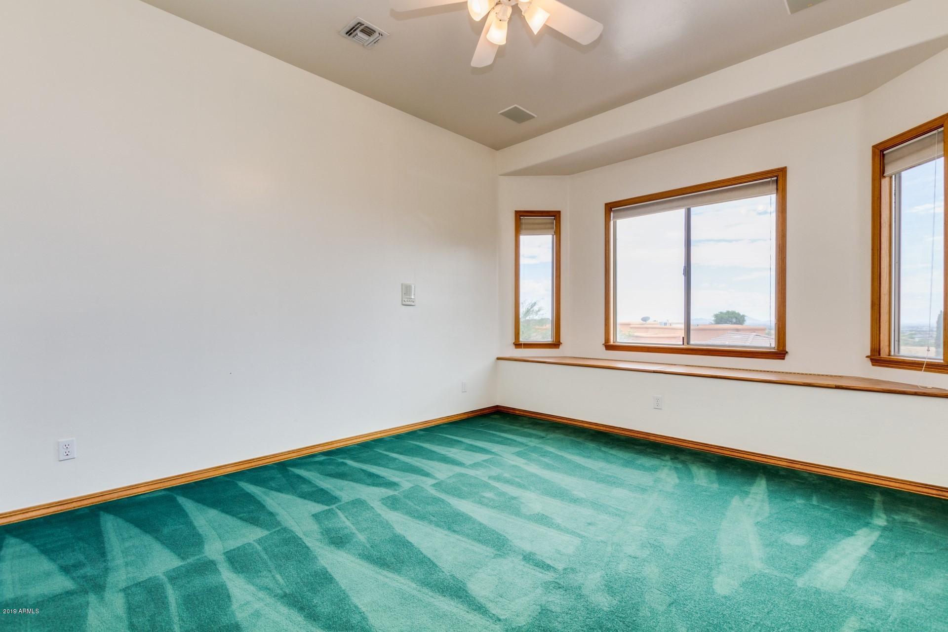 3530 North Hawes Road, Unit 11 Mesa, AZ 85207 - Photo 34 of 60 wooden floor in an empty room with a window