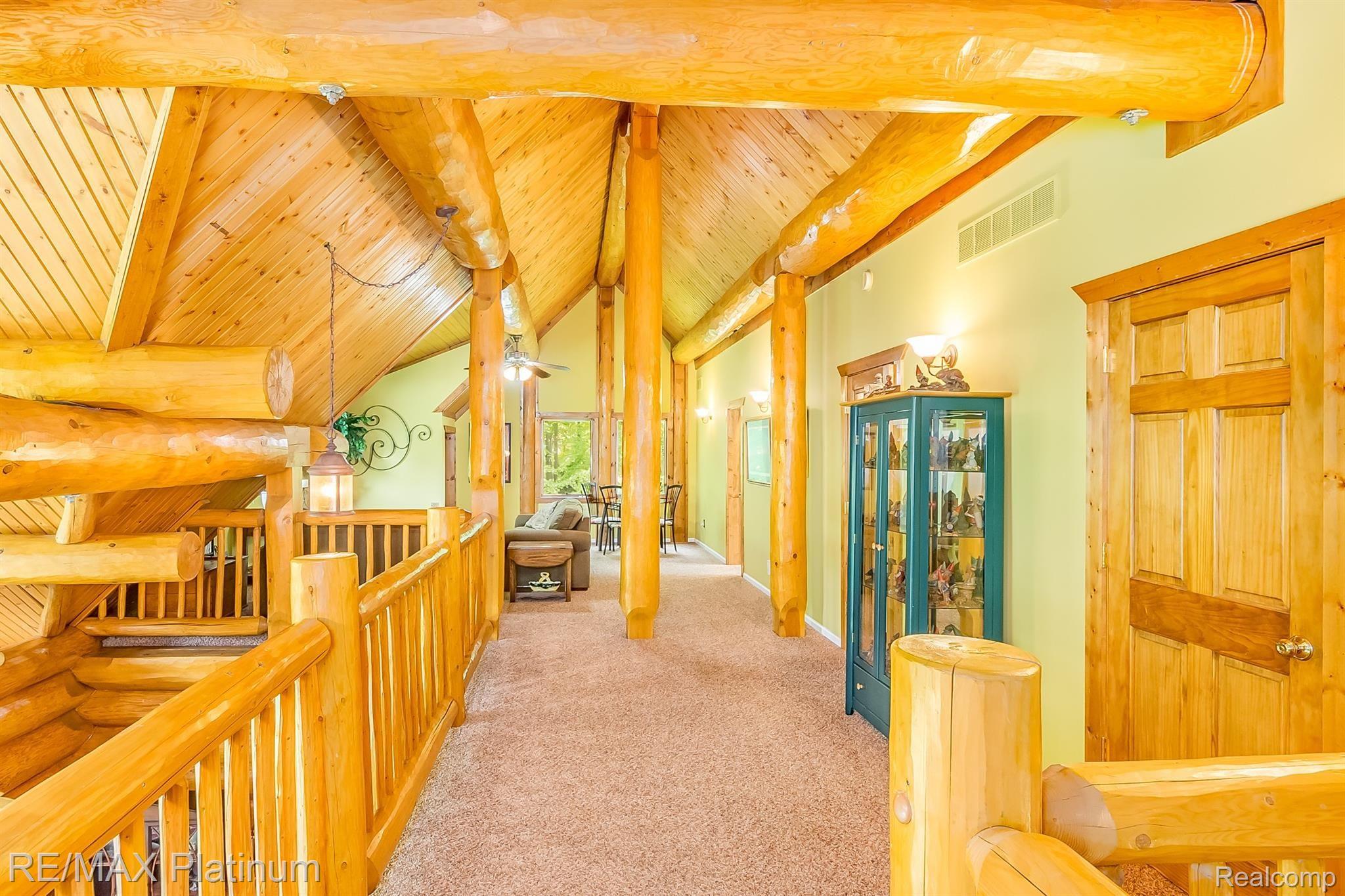 8335 Cedar Lake Road Pinckney, MI 48169 - Photo 14 of 55 Walkway from 2nd Floor Bedrooms to Loft Sitting Area