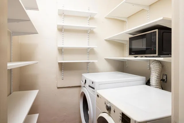 a kitchen with a stove and cabinets