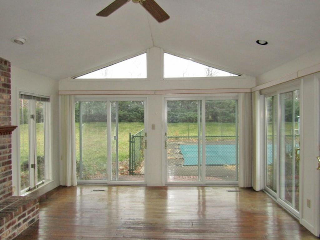 3143 Robinson Run Road McDonald, PA 15057 - Photo 12 of 37 a view of empty room with wooden floor and fan