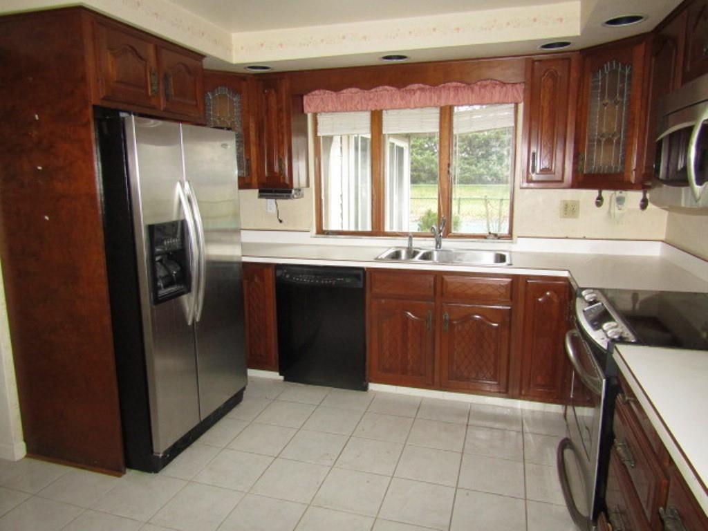 3143 Robinson Run Road McDonald, PA 15057 - Photo 16 of 37 a kitchen with a sink stove and refrigerator