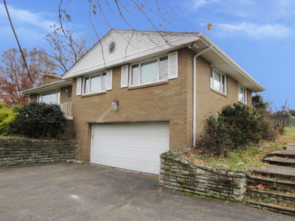 3143 Robinson Run Road McDonald, PA 15057 - Photo 2 of 37 a front view of a house with a yard