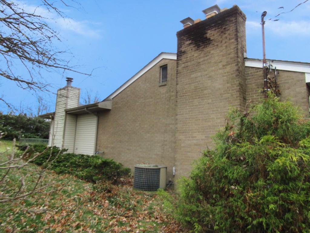 3143 Robinson Run Road McDonald, PA 15057 - Photo 3 of 37 a brick building with a yard