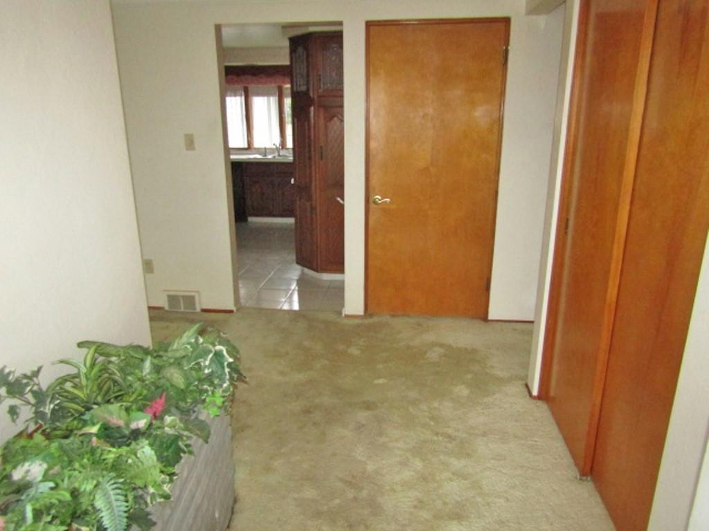 3143 Robinson Run Road McDonald, PA 15057 - Photo 6 of 37 an empty room with an entryway door