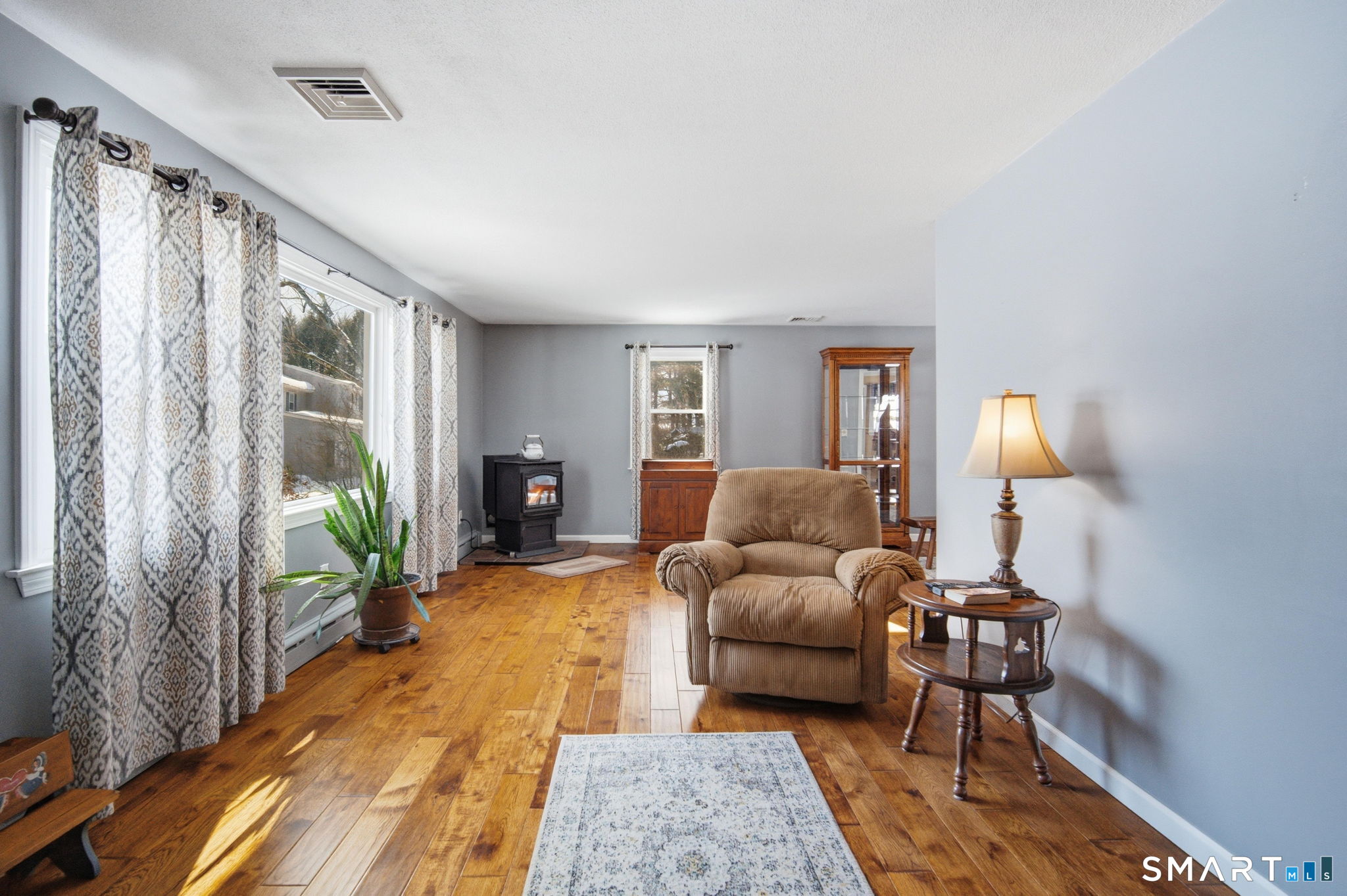 45 Sokol Road Somers, CT 06071 - Photo 13 of 36 a bedroom with furniture and a lamp