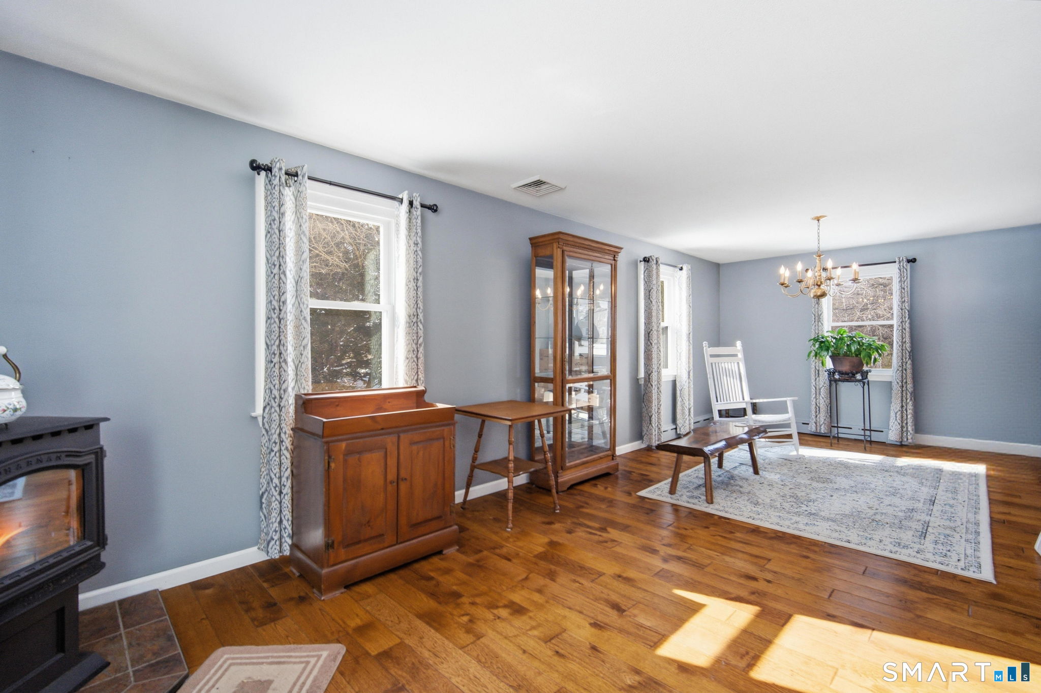 45 Sokol Road Somers, CT 06071 - Photo 14 of 36 a living room with furniture a window and wooden floor