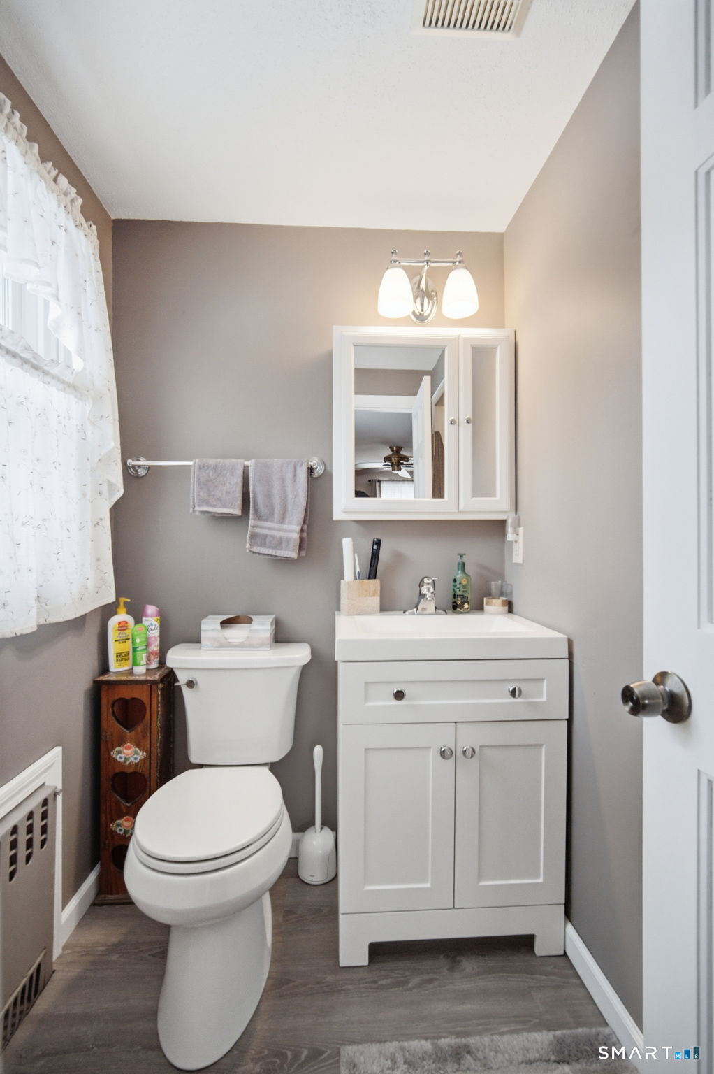 45 Sokol Road Somers, CT 06071 - Photo 24 of 36 a bathroom with a granite countertop toilet sink and mirror