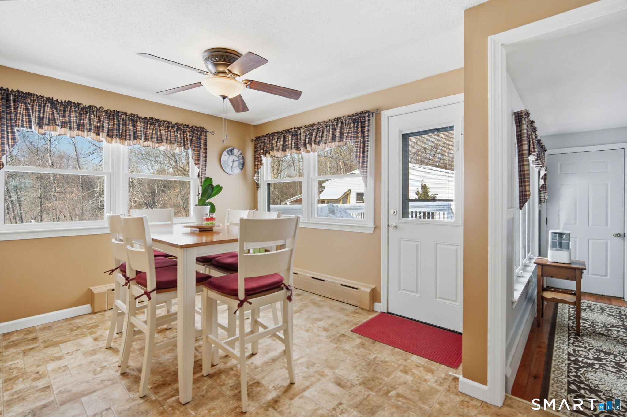 45 Sokol Road Somers, CT 06071 - Photo 8 of 36 a workspace with wooden floor and a chandelier fan