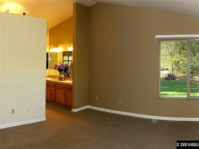 22886 Blackwillow Way Reno, NV 89521 - Photo 6 of 9 a room with a bed and a window