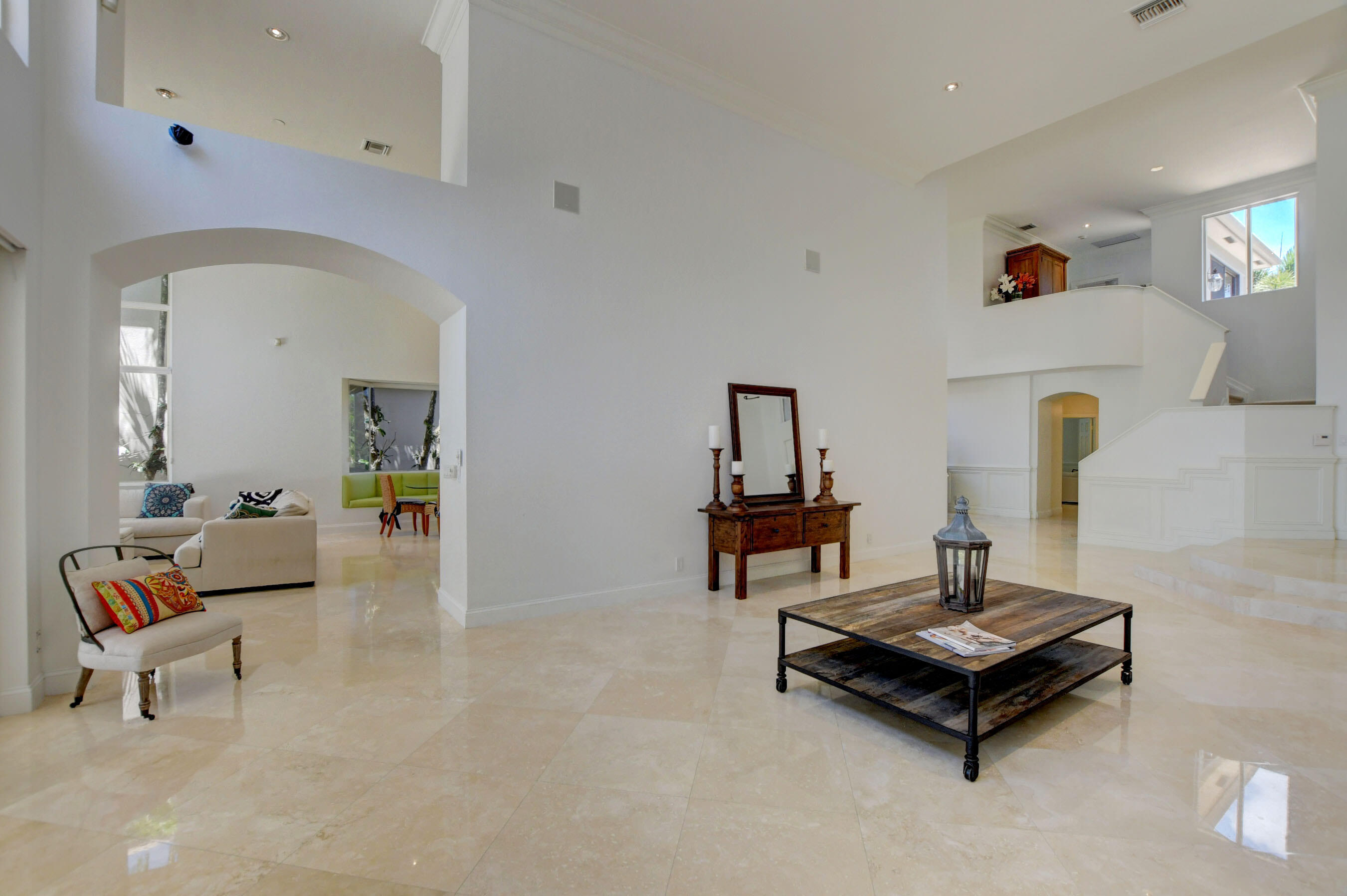 6174 Northwest 24th Way Boca Raton, FL 33496 - Photo 11 of 58 a living room with furniture and a table