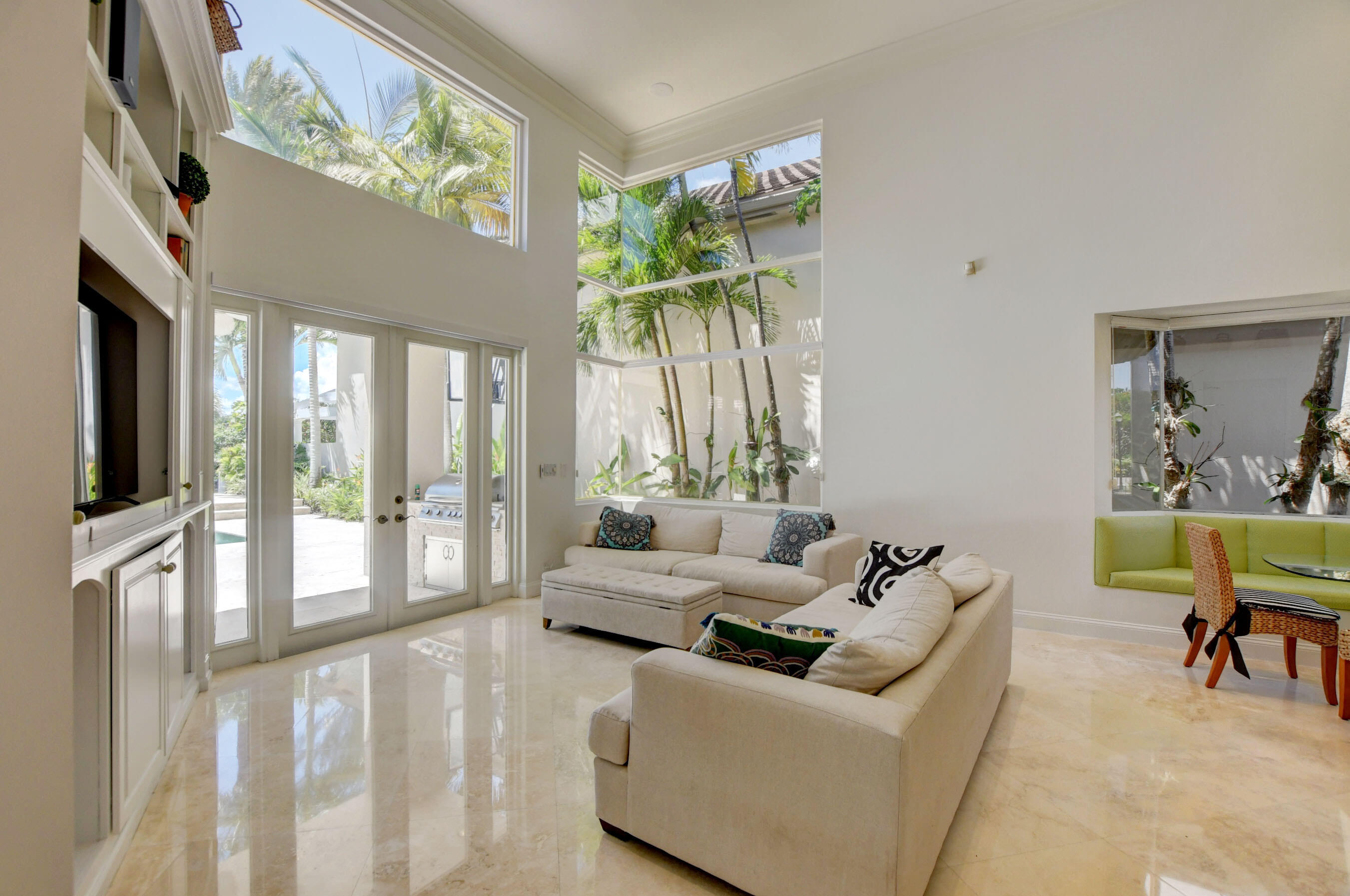 6174 Northwest 24th Way Boca Raton, FL 33496 - Photo 12 of 58 a living room with furniture and a large window