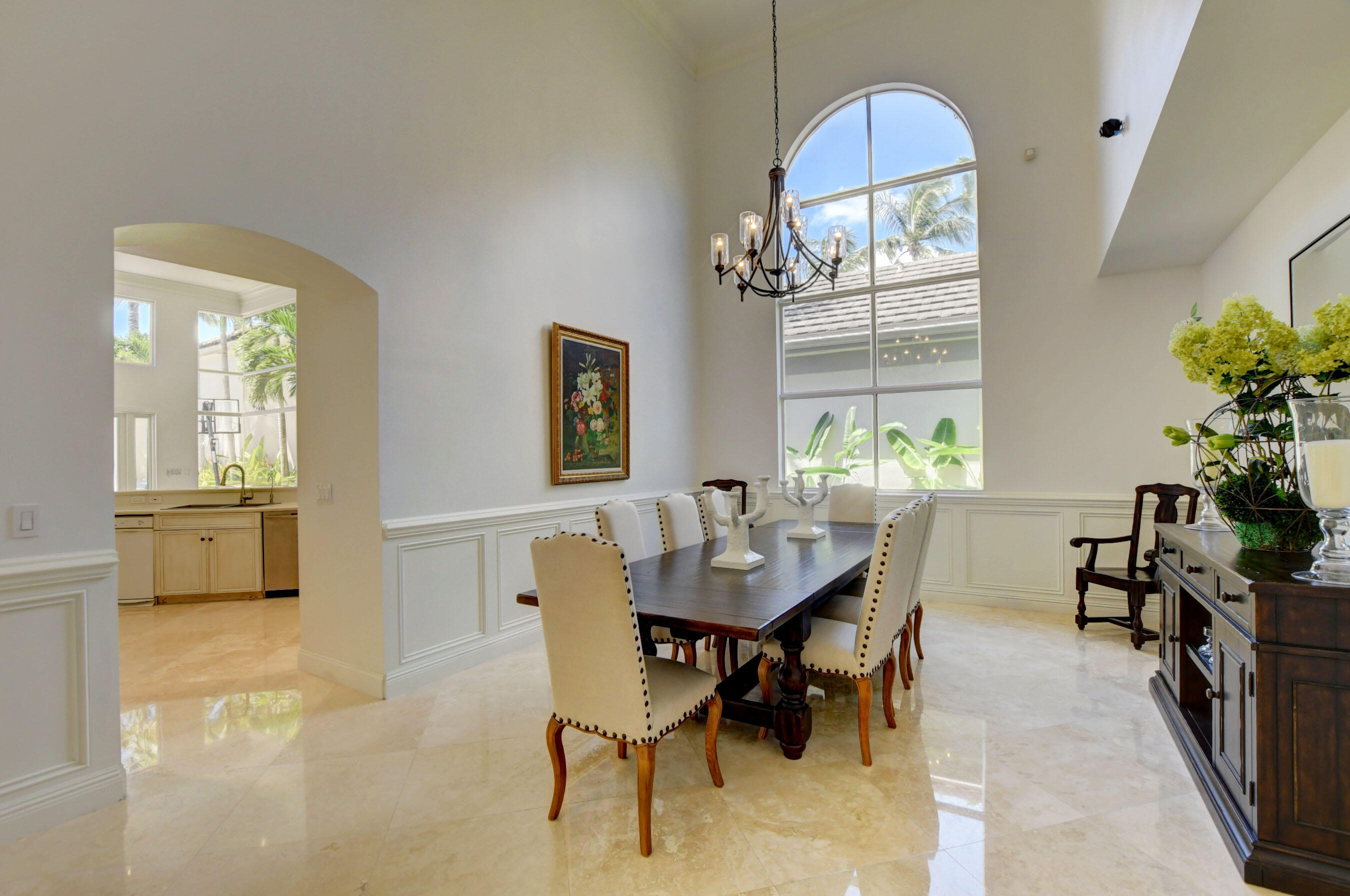 6174 Northwest 24th Way Boca Raton, FL 33496 - Photo 25 of 58 a view of a dining room with furniture and a potted plant