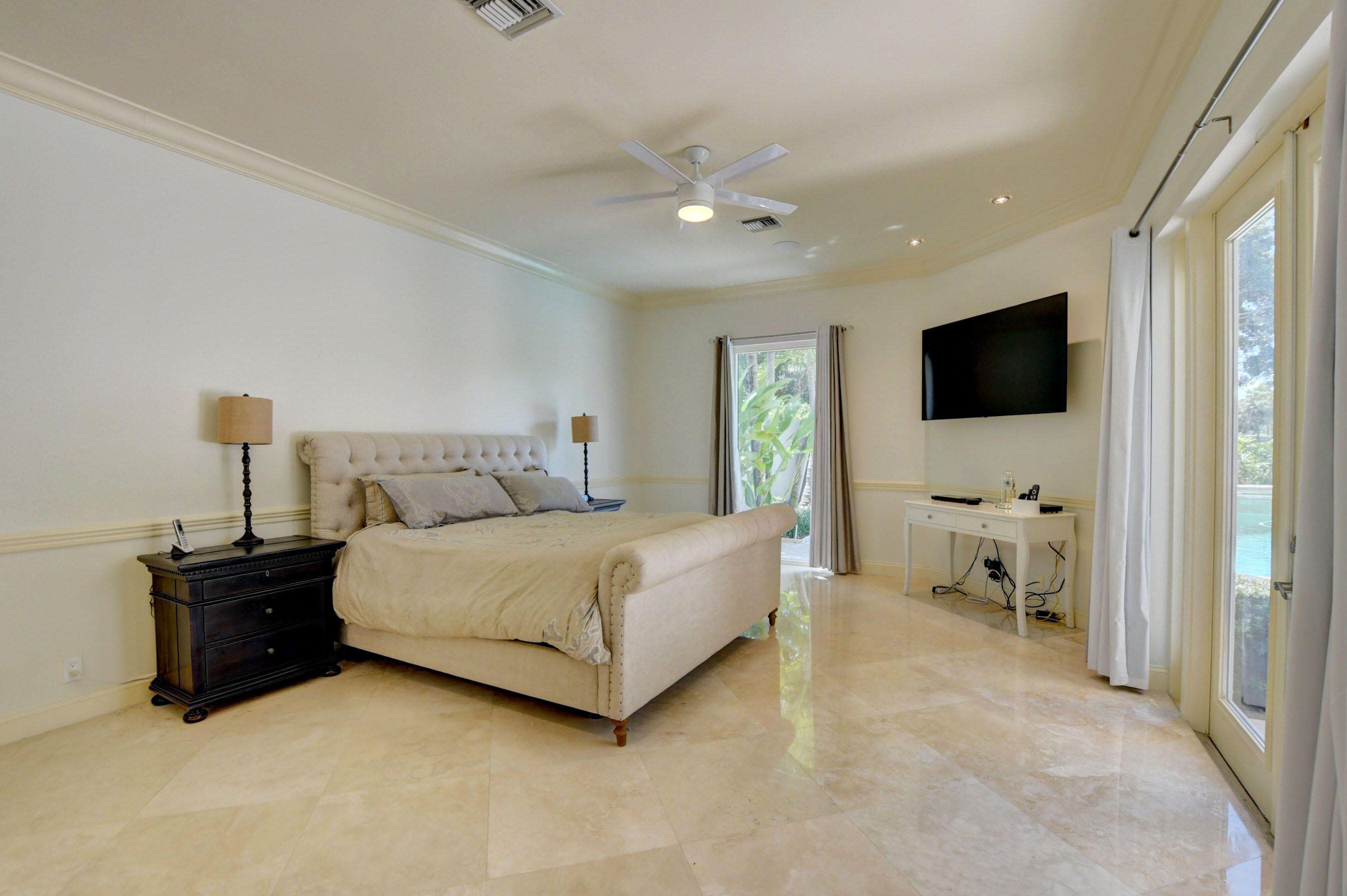 6174 Northwest 24th Way Boca Raton, FL 33496 - Photo 26 of 58 a living room with furniture and a flat screen tv