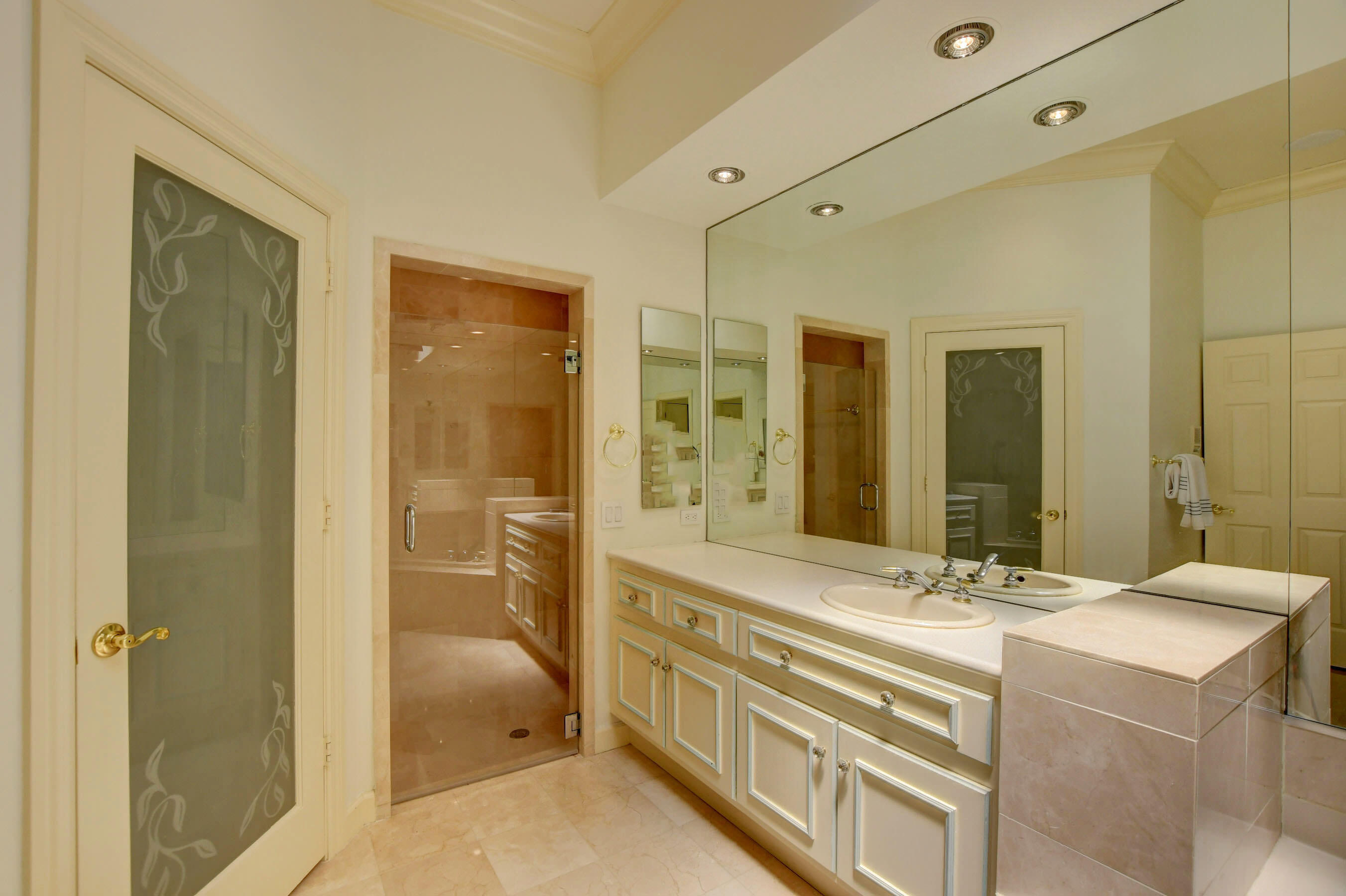 6174 Northwest 24th Way Boca Raton, FL 33496 - Photo 30 of 58 a bathroom with a double vanity sink mirror and double