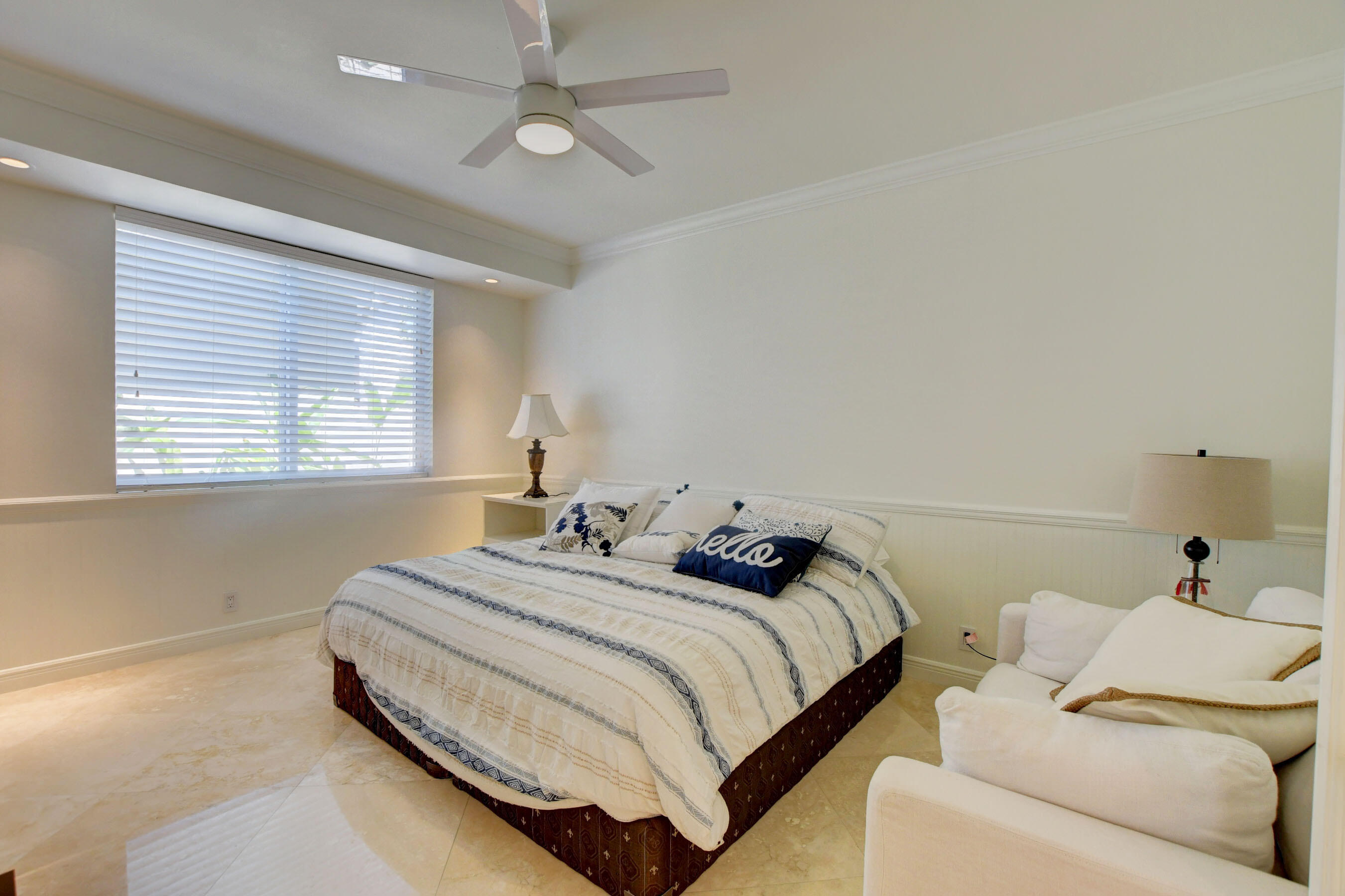 6174 Northwest 24th Way Boca Raton, FL 33496 - Photo 32 of 58 a bed room with two beds and a window